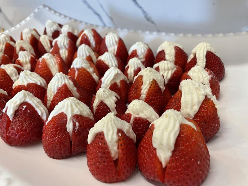Fresh strawberries filled with piped cream