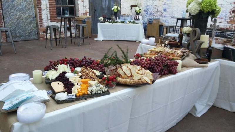 Long catered grazing table set up for an event