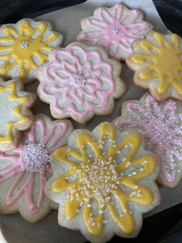 Flower-shaped decorated sugar cookies