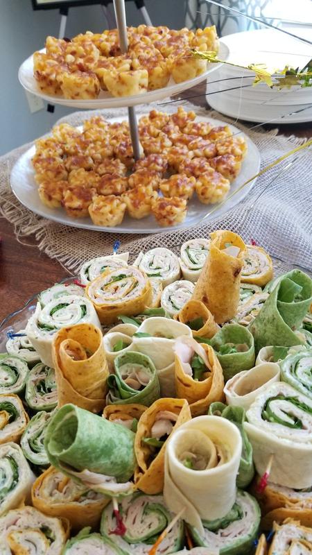 Tiered mac and cheese bites with pinwheel roll-ups