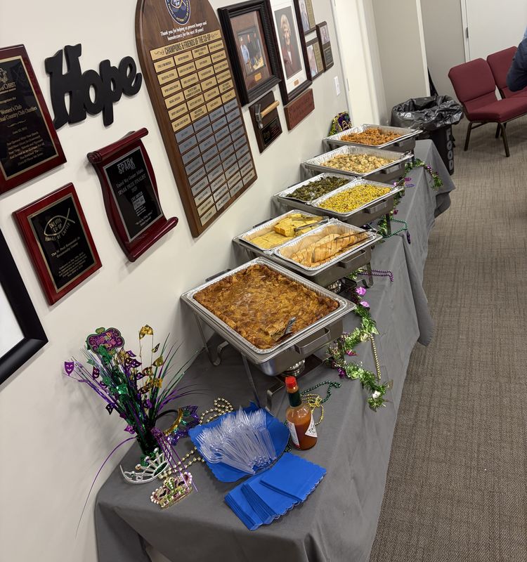 Mardi Gras themed buffet with chafing dishes