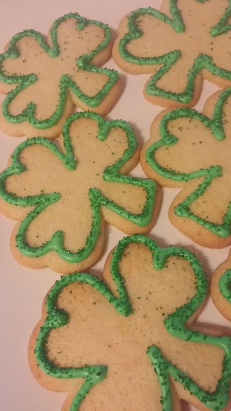 Shamrock-shaped cookies with green sugar edges