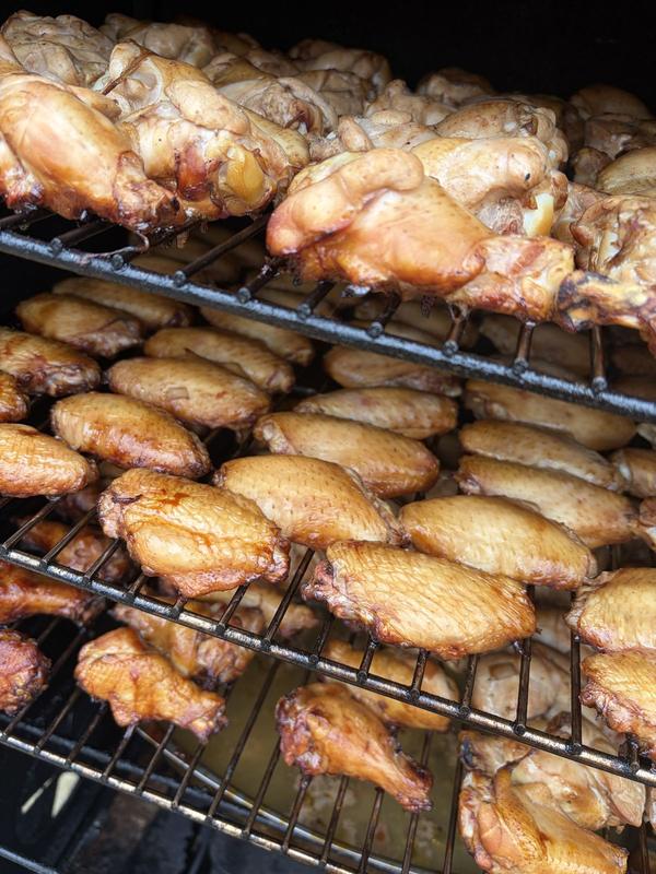 Freshly smoked chicken wings on a rack